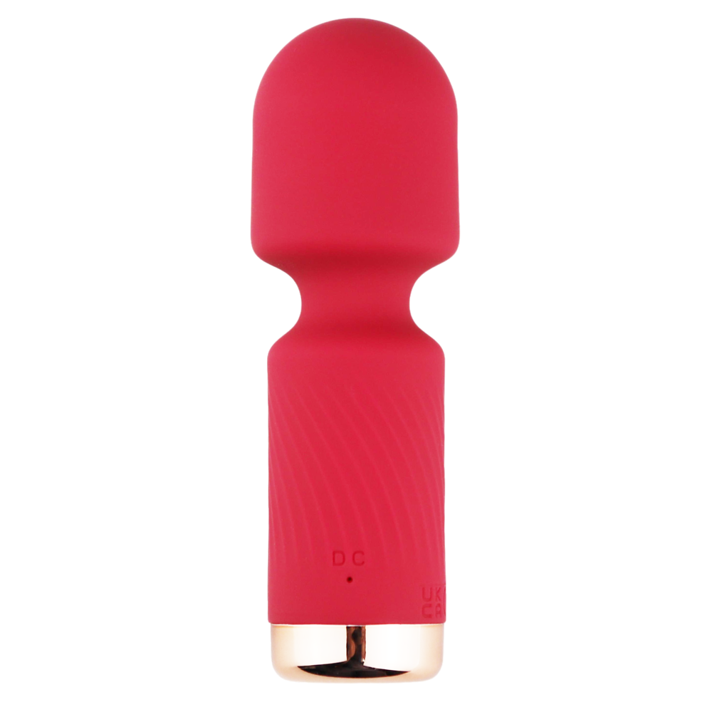 Red silicone mini wand vibrator with gold base on transparent background