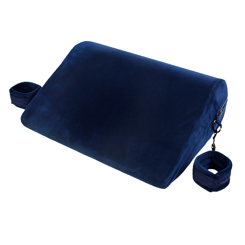 Velvet blue triangle sex pillow with rounded corners and attached cuffs on both sides